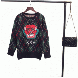 Pull épais de pulls tricotés par ordinateur épais de visage de dragon de patchworks d'hiver