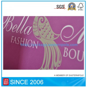 Sac en papier violet avec poignée nouée