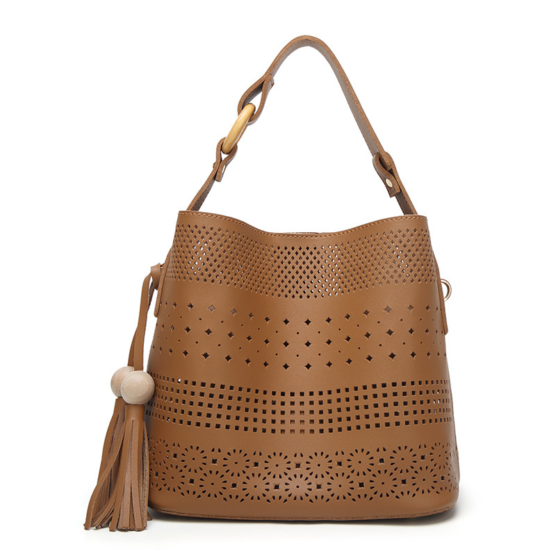HD0827 - Vente en gros d'un sac à bandoulière en cuir creux pour femmes, Shopping
