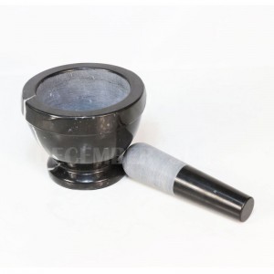 Mortier et pilon en marbre noir