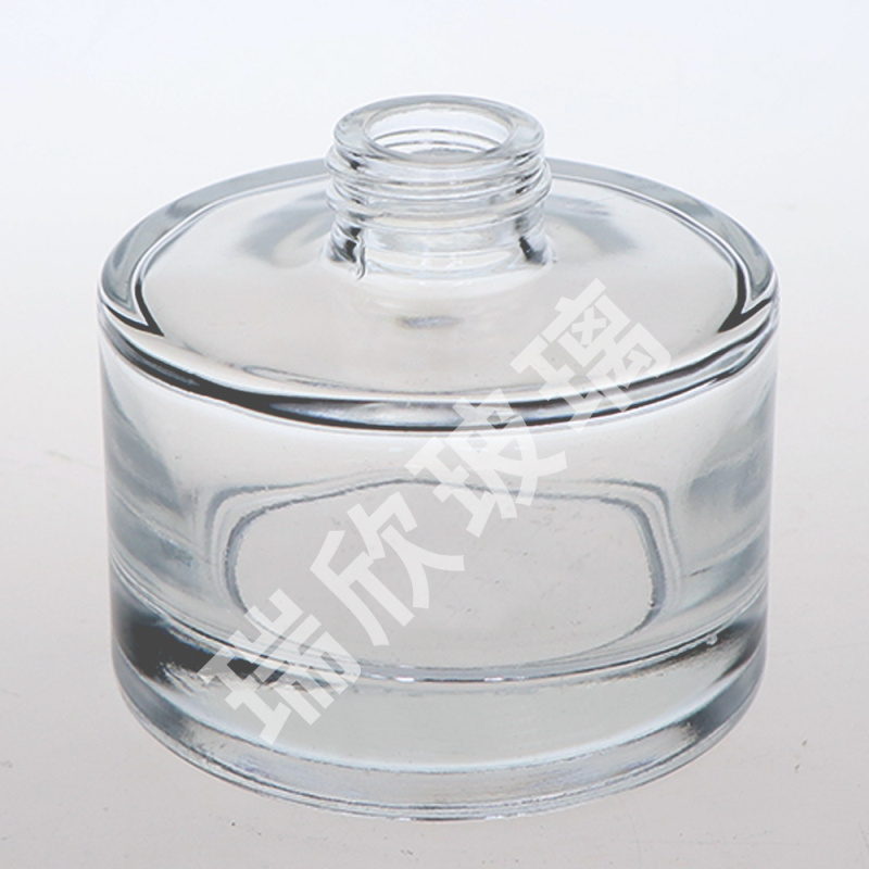 Diffuseur de roseaux de bouteille en verre de type rond de 100 ml avec capuchon à rouleau