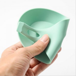 Gardin de cuisine en gros de la chaleur porte-cuillère de forme d\'amande de forme d\'amande la louche à la cuillère en silicone repos