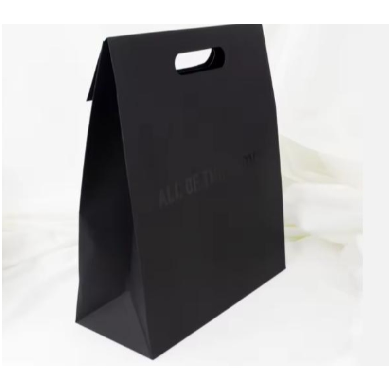 Handle de luxe taillée de vêtementsnoirs Shopping Paper Paper Bijoux Bijoux Cosmetic Custom Logo Emballage Conception Papier Sacs-cadeaux