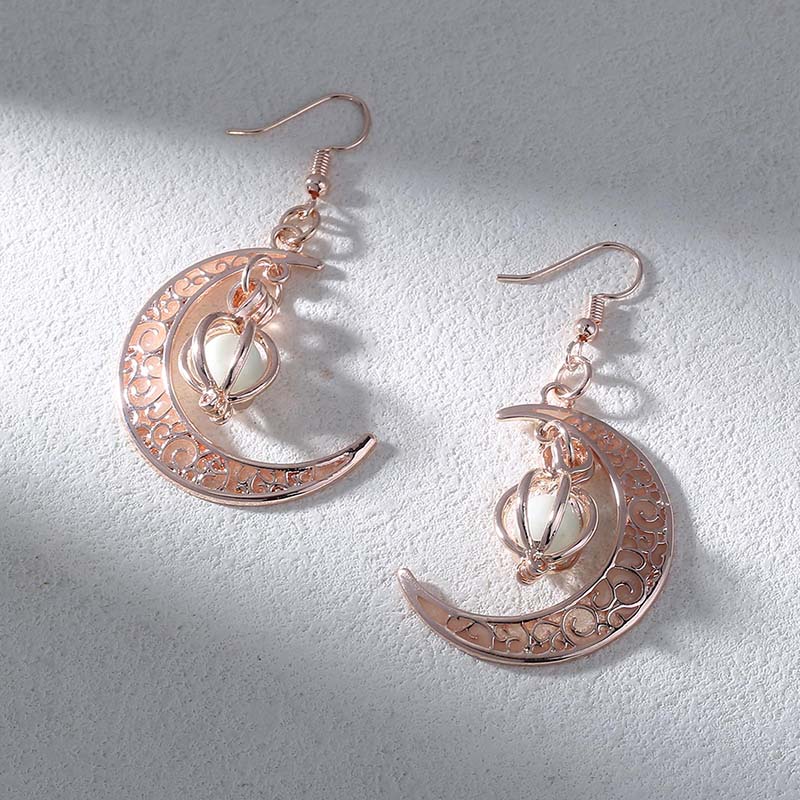 Hongde – boucles d'oreilles croissant de lune en argent qui brillent dans lenoir