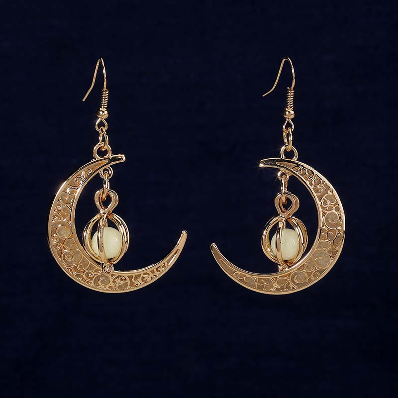 Hongde – boucles d'oreilles croissant de lune en argent qui brillent dans lenoir